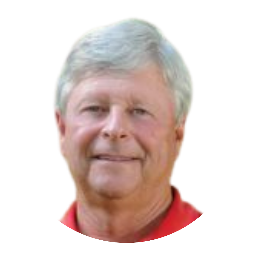 A man with gray hair and a slight smile, wearing a red polo shirt, is photographed against a white background in a circular crop.